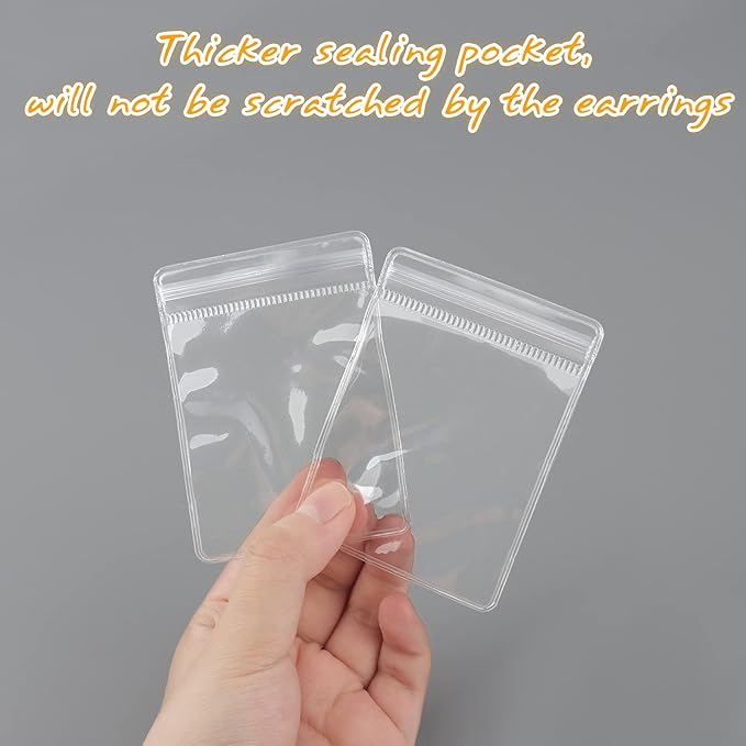 DesignSter Jewelry Storage Book, Earring Organizer Book, Jewelry Storage Bag Thicken Anti-Oxidation, Jewelry Travel Organizer (84Grids+50pcs Ziplock Bags)
