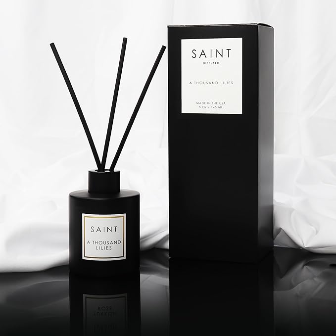 SAINT Reed Diffuser, Aromatherapy Diffuser Set with Scent Diffuser Sticks, Long-Lasting Oil Diffuser in Matte Black Glass Jar, Aroma Diffuser for Home, Bedroom, or Bathroom, 5oz, A Thousand Lilies