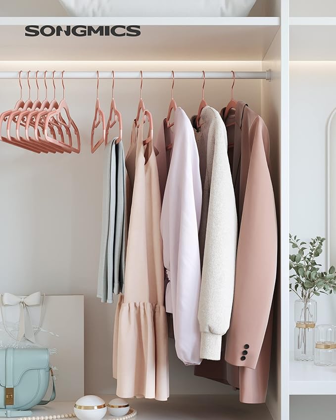 SONGMICS Pack of 50 Coat Hangers, Space-Saving Plastic Clothes Hangers, Non-Slip, 0.2 Inches Slim, 16.5 Inches Wide, 360° Swivel Rose Gold Hook, Light Pink UCRP20PK05