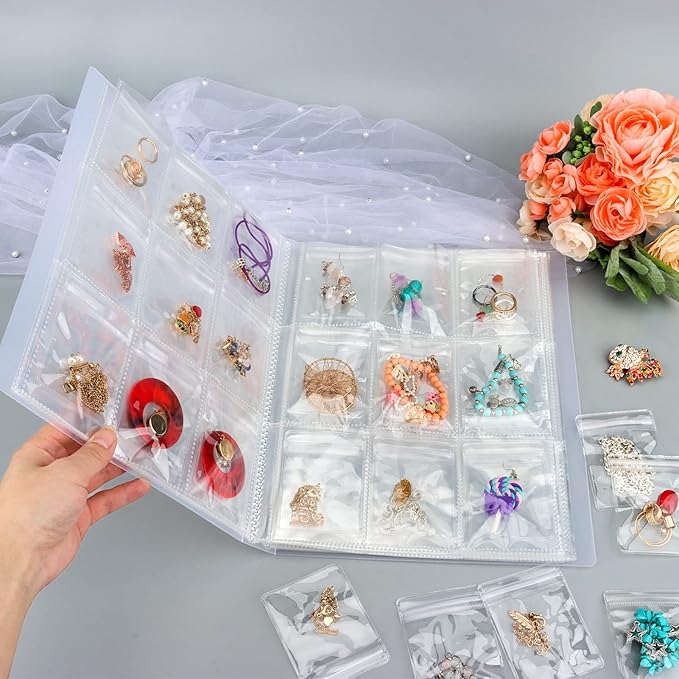 Designster Transparent Jewelry organizer book - Earring Organizer Storage Book Bag Anti-Oxidation, Jewelry Travel Organizer (288Slots+150pcsZipper Bags)
