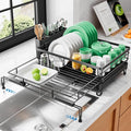 Kitsure Extendable Dish Drying Rack - Rust-Resistant Dish Racks for Kitchen Counter with Adjustable Support Legs, Cutlery Holder & Removable Draining Tray (Black, 15.6''-25.2''L × 16.9''W × 8.1''H)
